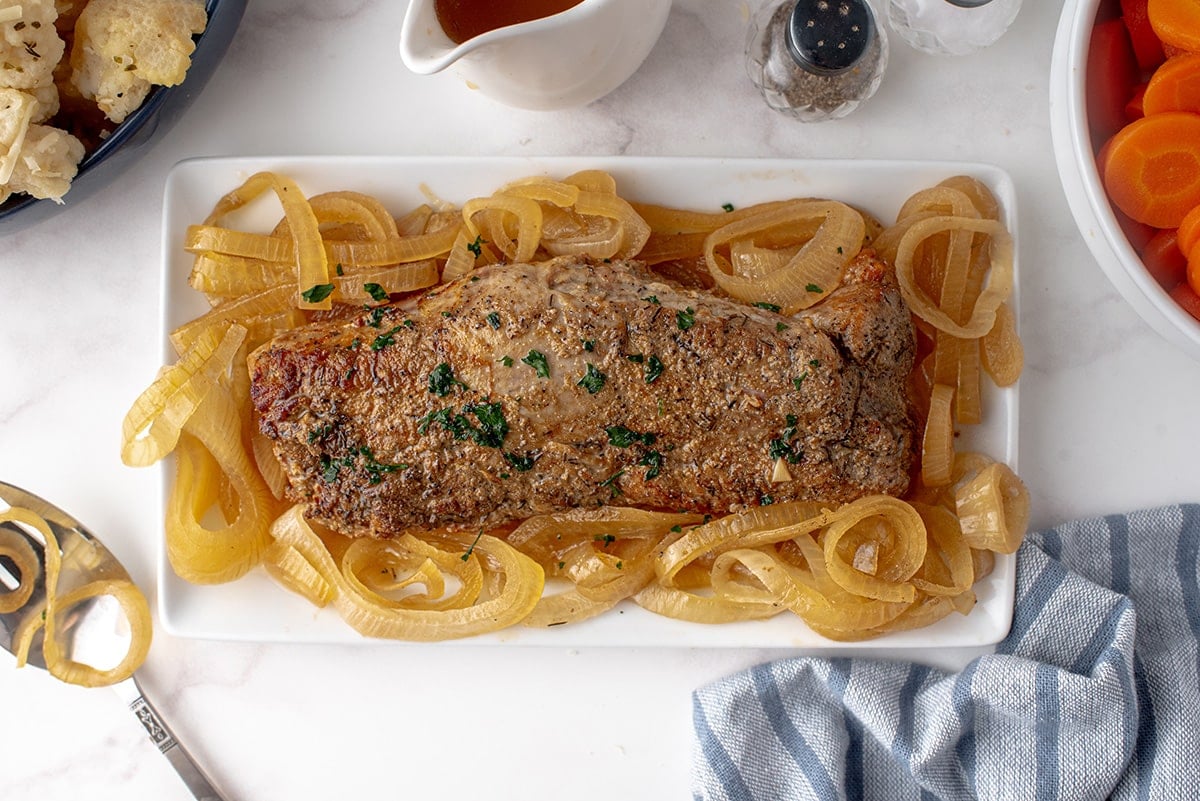 overhead of pork loin with onions 