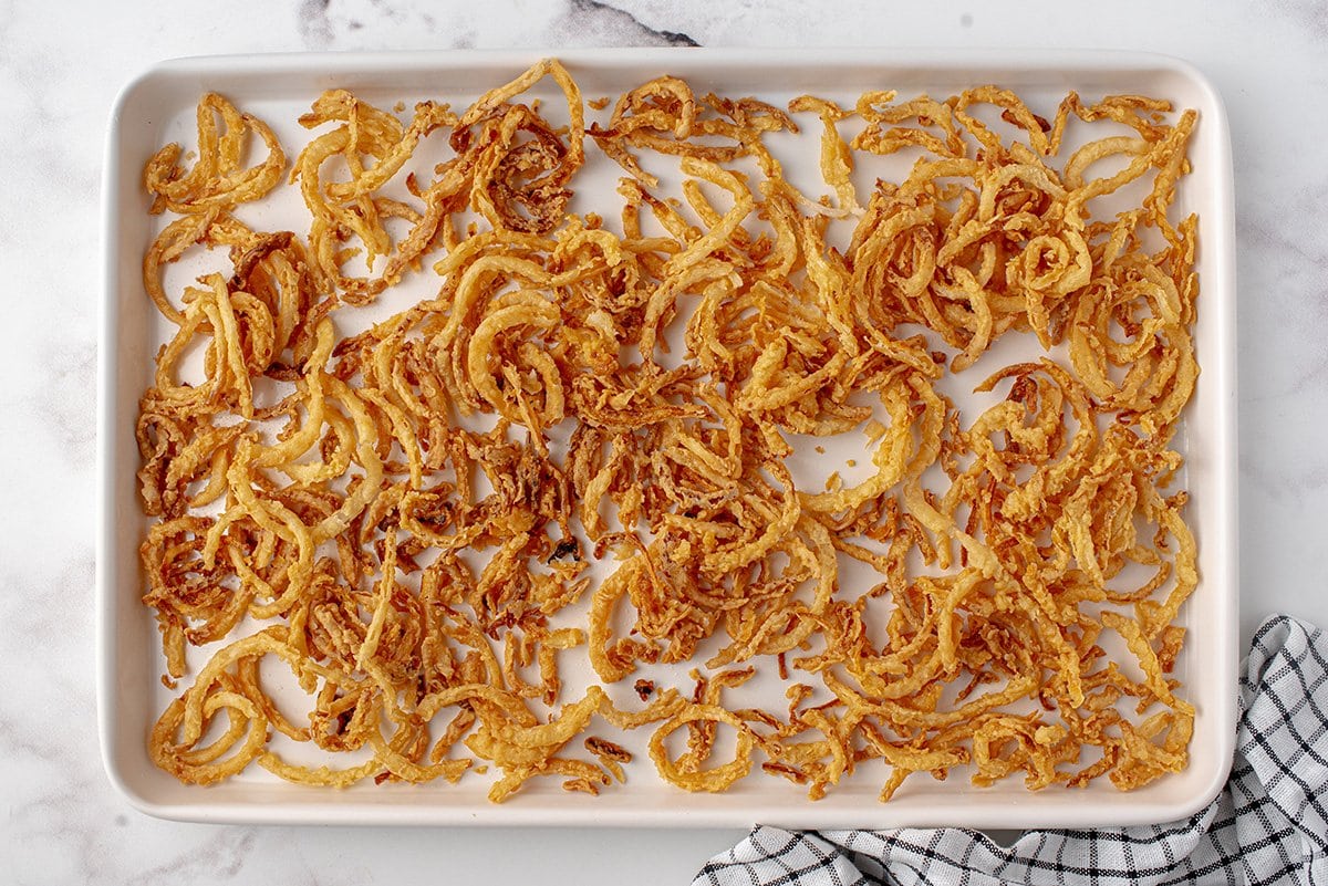 crispy fried onions on a baking sheet