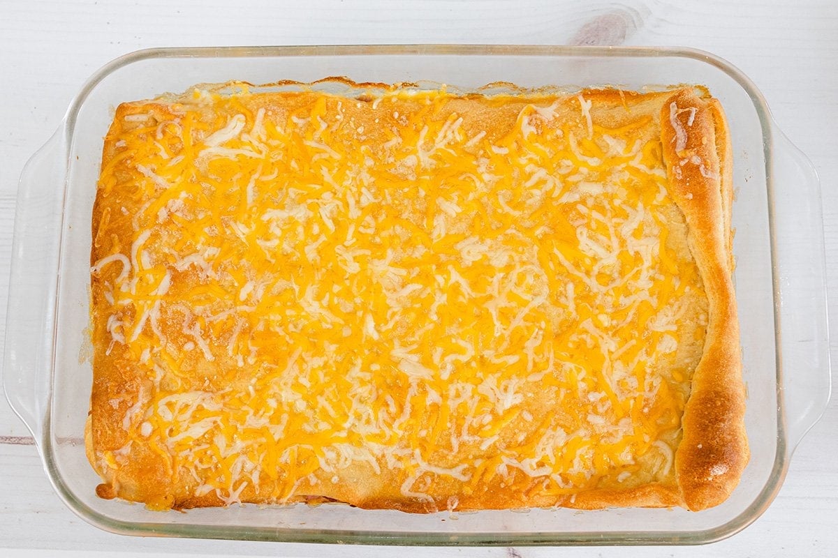overhead of ham and cheese casserole in baking dish 