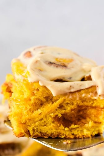 pumpkin cinnamon roll with frosting