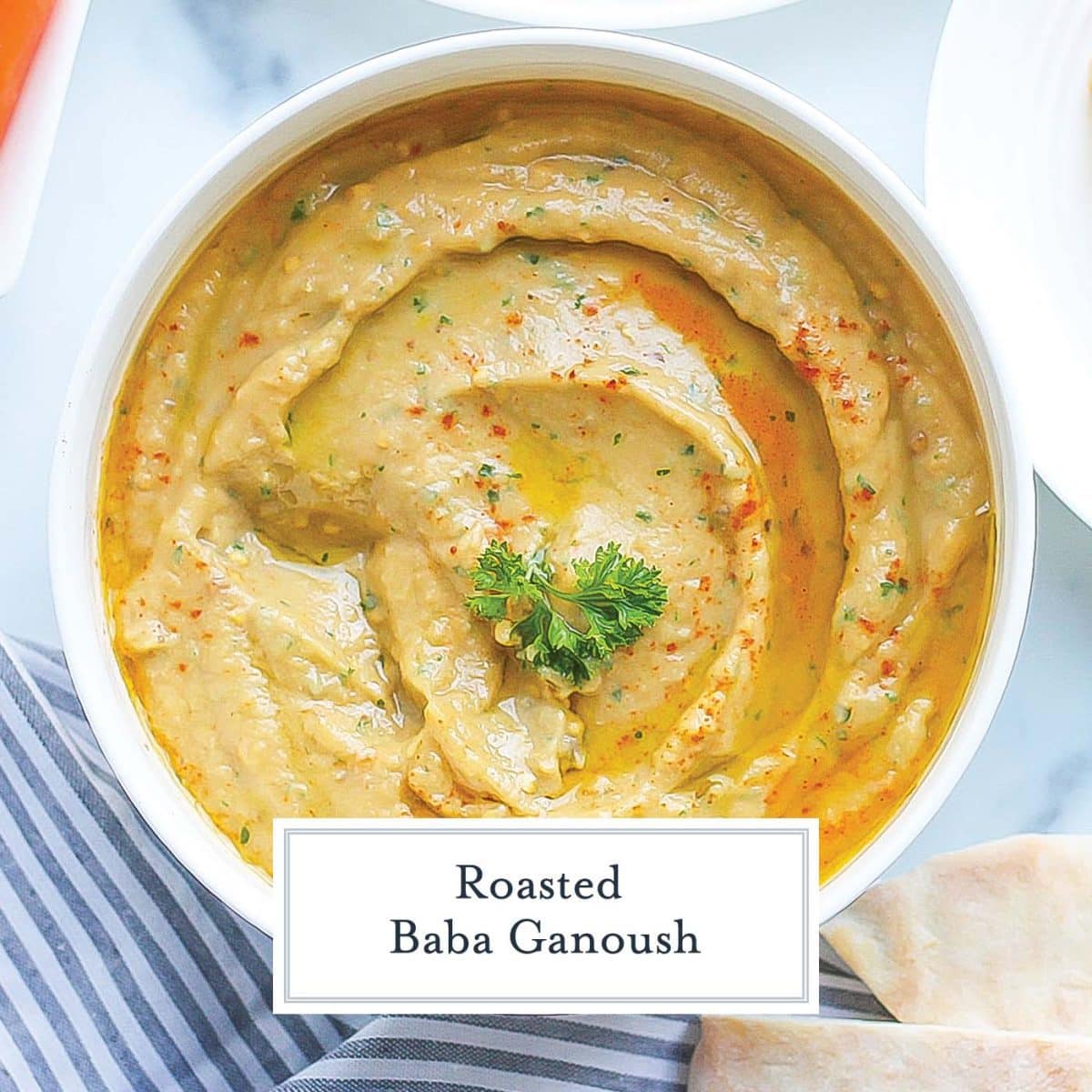 close up overhead of creamy baba ganoush with olive oil and spices 