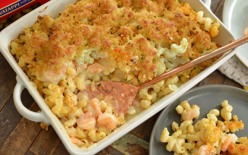 overhead of seafood mac and cheese in a casserole dish