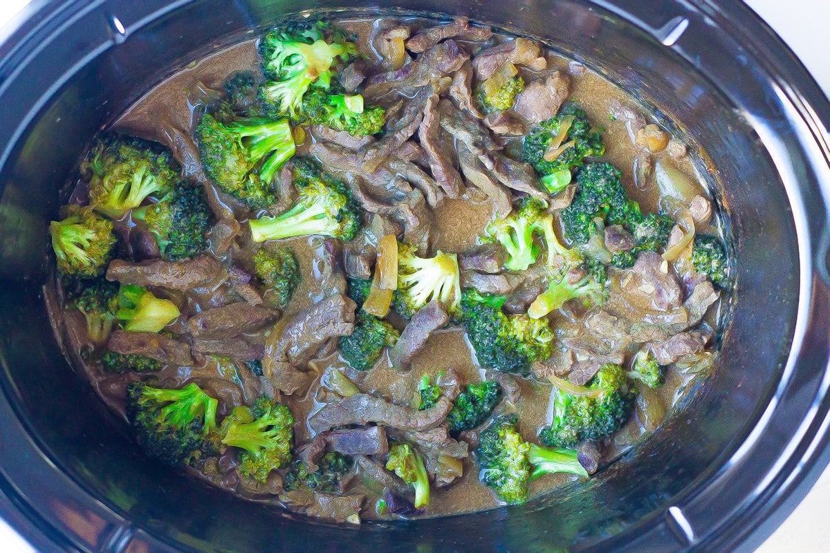 beef and broccoli in a slow cooker pot  