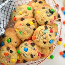 overhead of trail mix cookies on a wire cooling rack