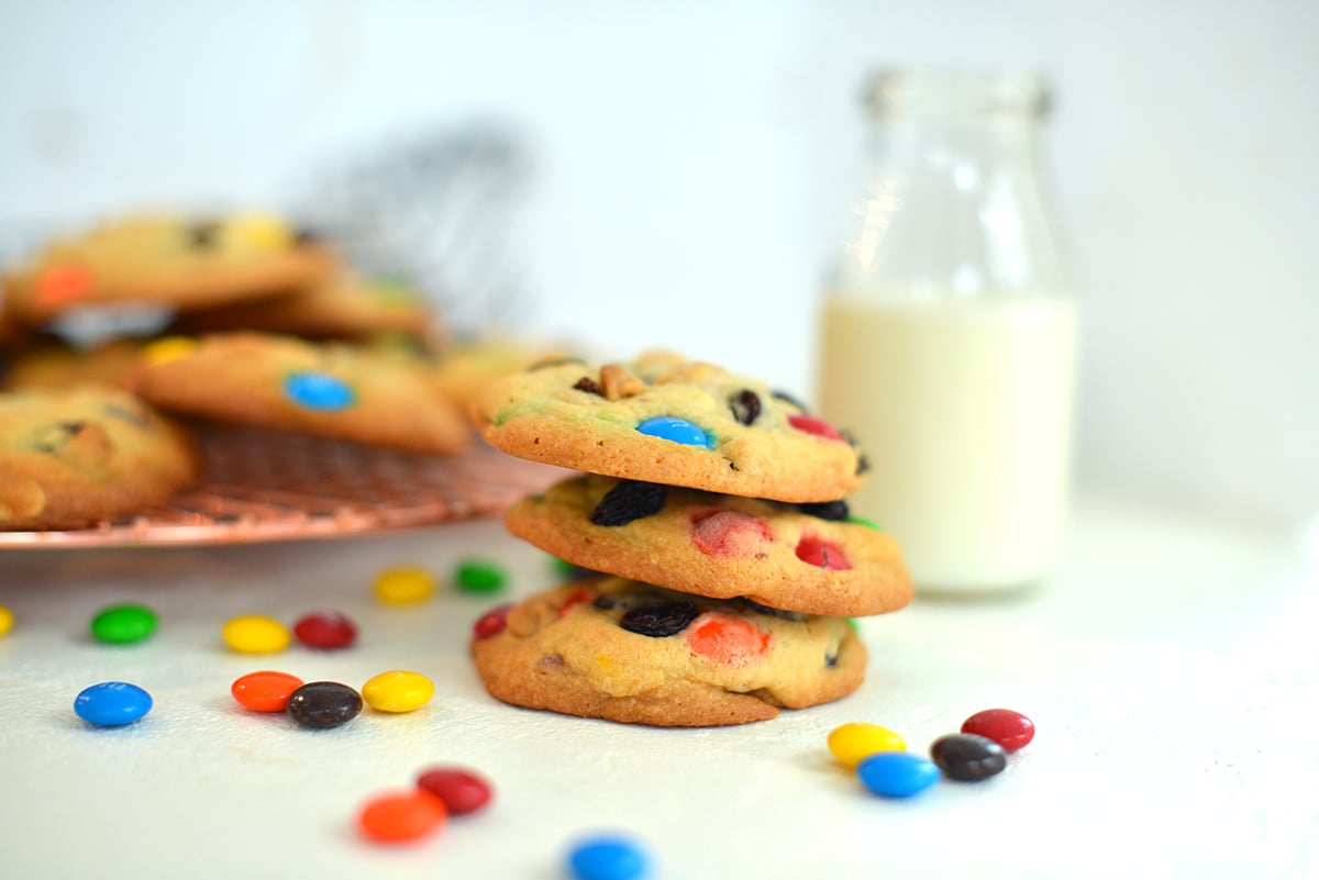 stack of homemade cookies with m&ms. 