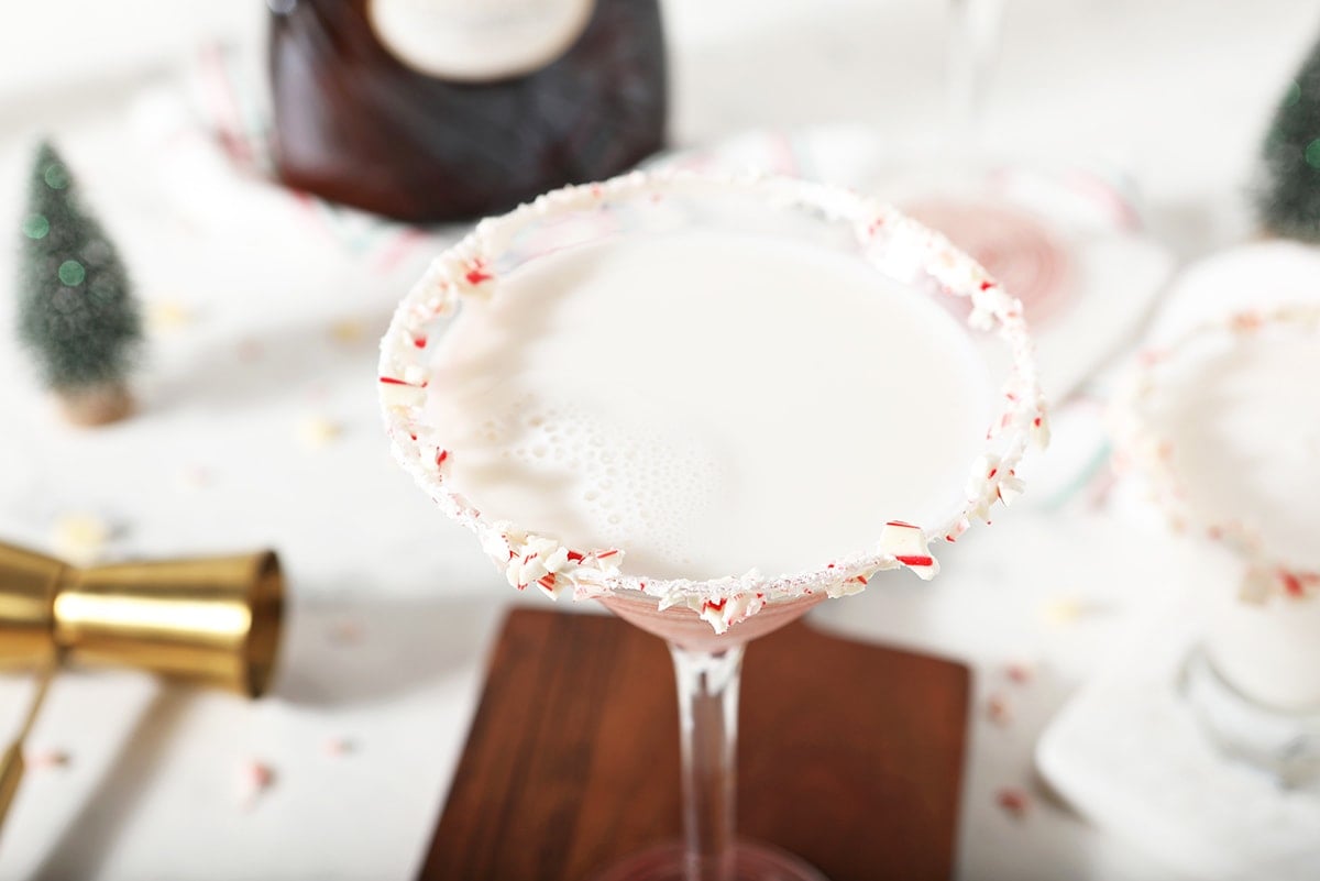 angle of a white chocolate martini in a tall glass