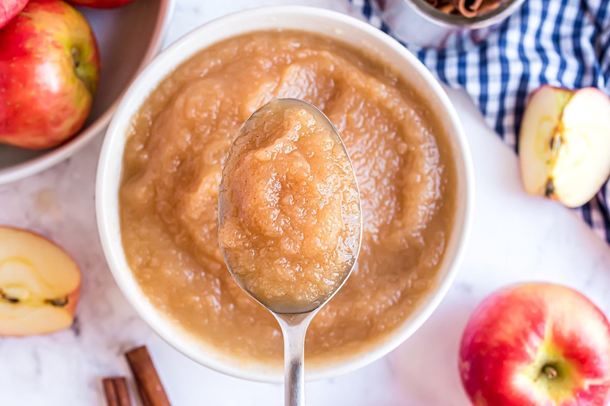 spoon with cinnamon applesauce 