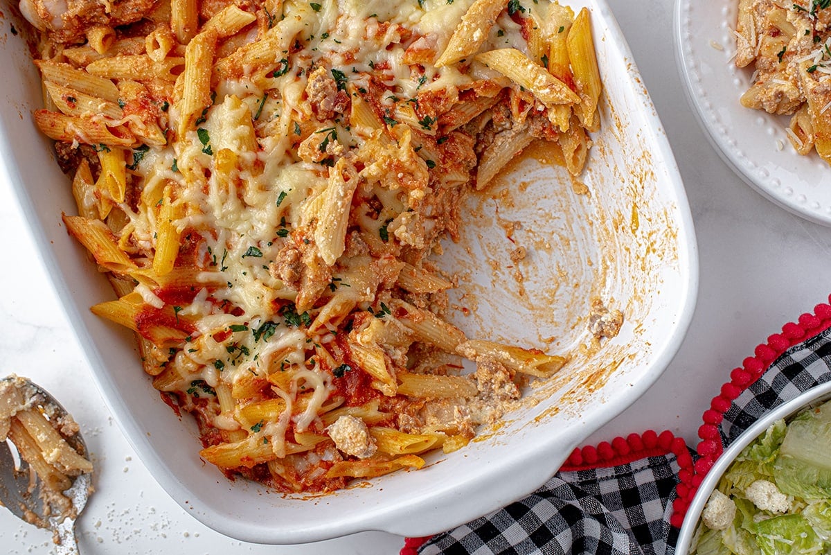 half eaten baked mostaccioli casserole dish 