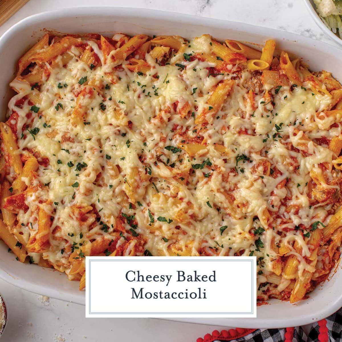 overhead of melted cheese on a baked pasta dish