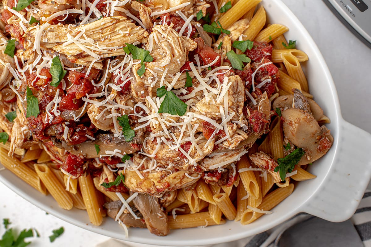 close up of balsamic chicken pasta in a serving dish 