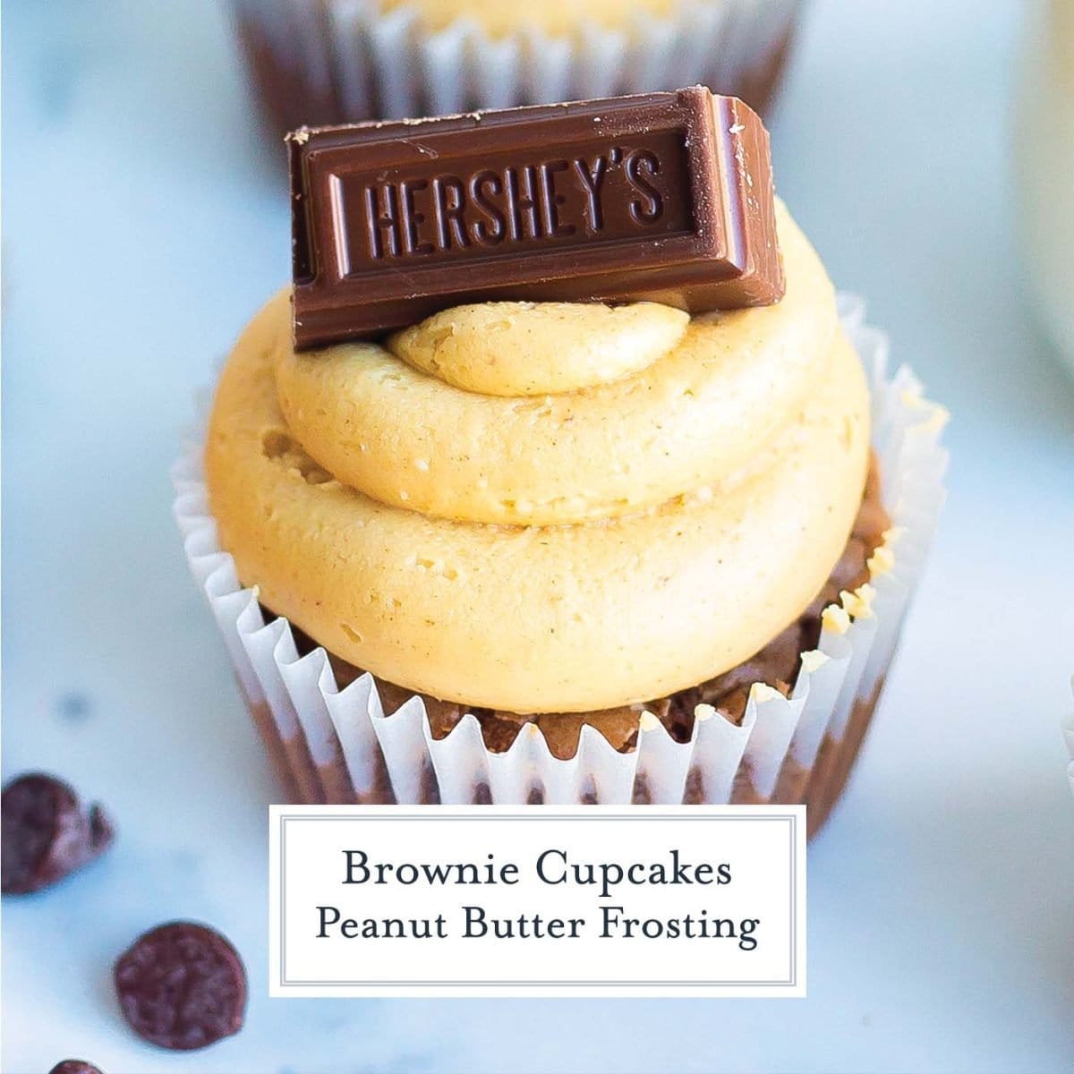 close up of chocolate brownie cupcake with peanut butter frosting