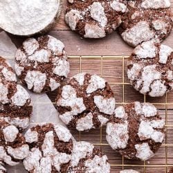 chocolate crinkle cookies on a wire cooling rack