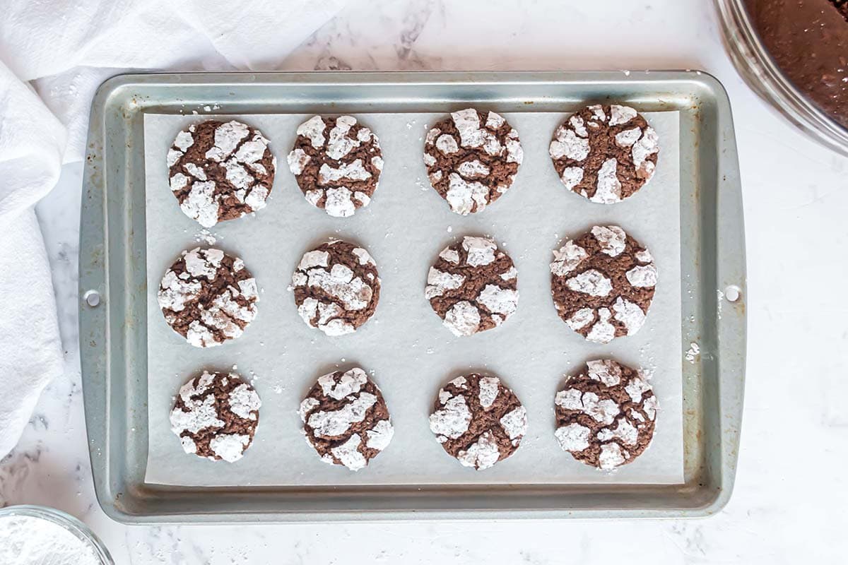 crinkle cookies on a baking sheet 