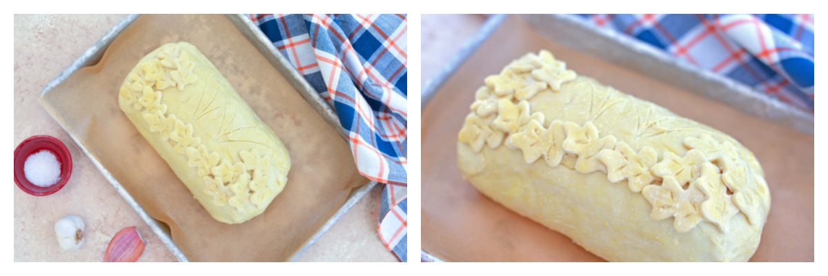 puff pastry wrapped beef tenderloin on a parchment lined baking sheet 