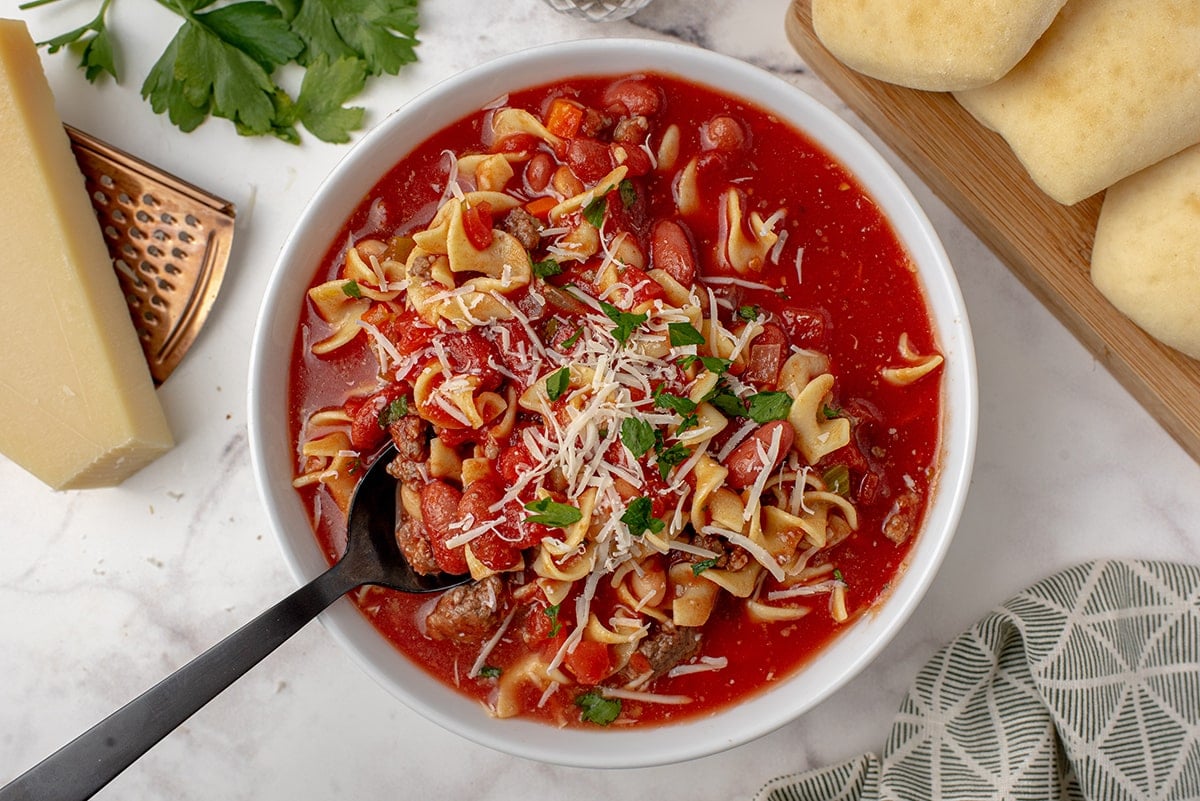 pasta e fagioli soup with cheese and parsley 