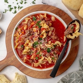 pasta e fagioli soup in a bowl with a spoon