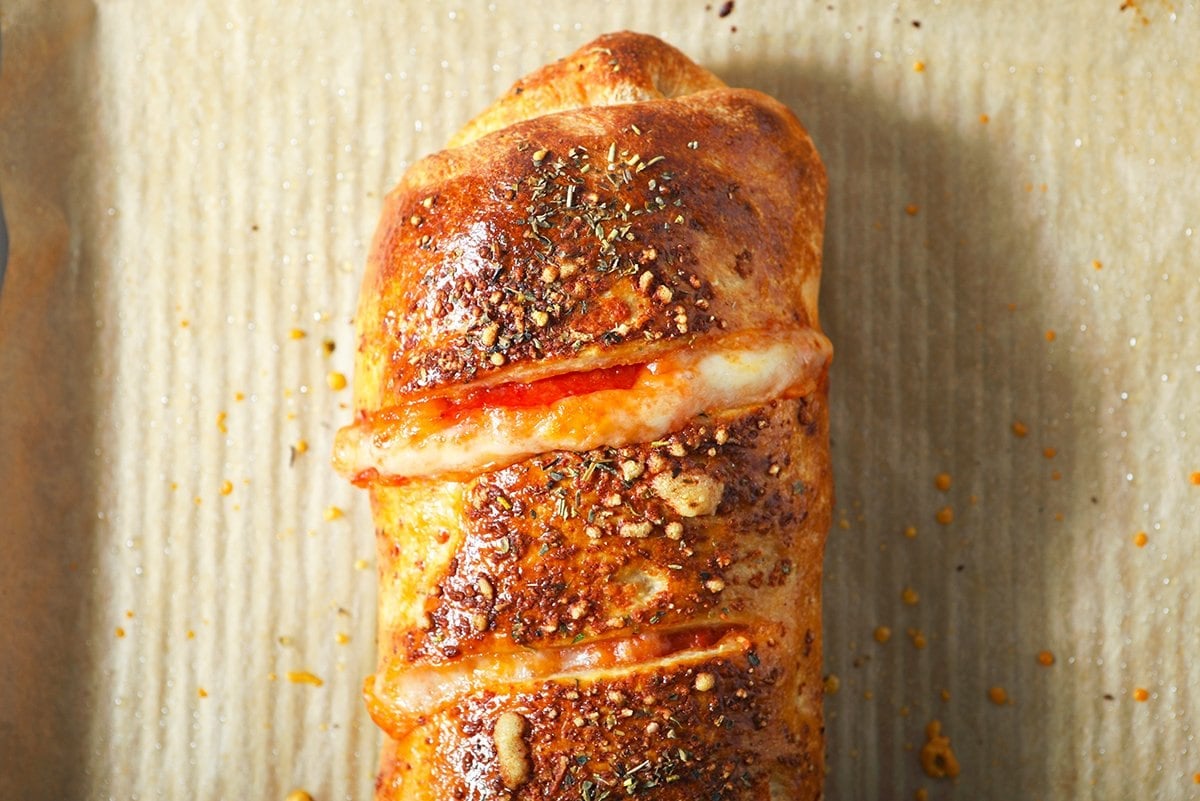 close up of end of a cooked stromboli 