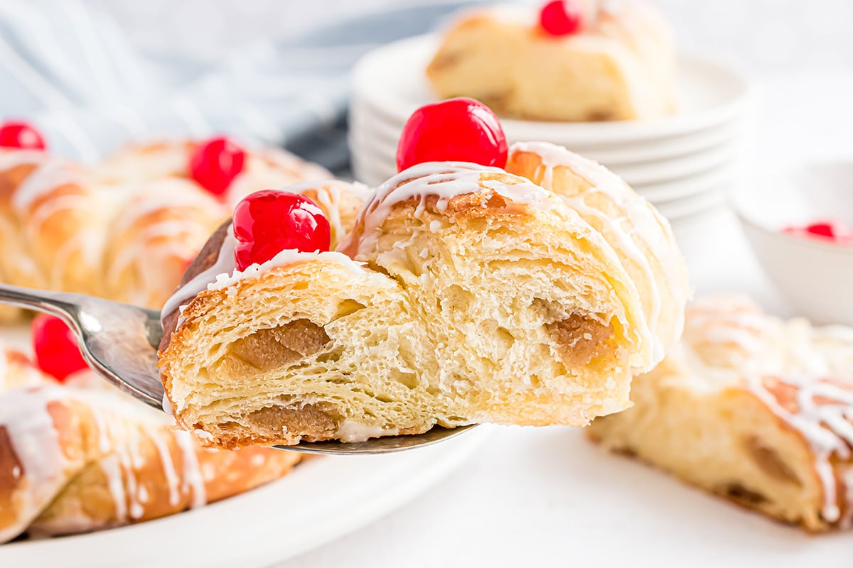 cross sectional view of a slice of pastry showing almond filling a layers of pastry dough