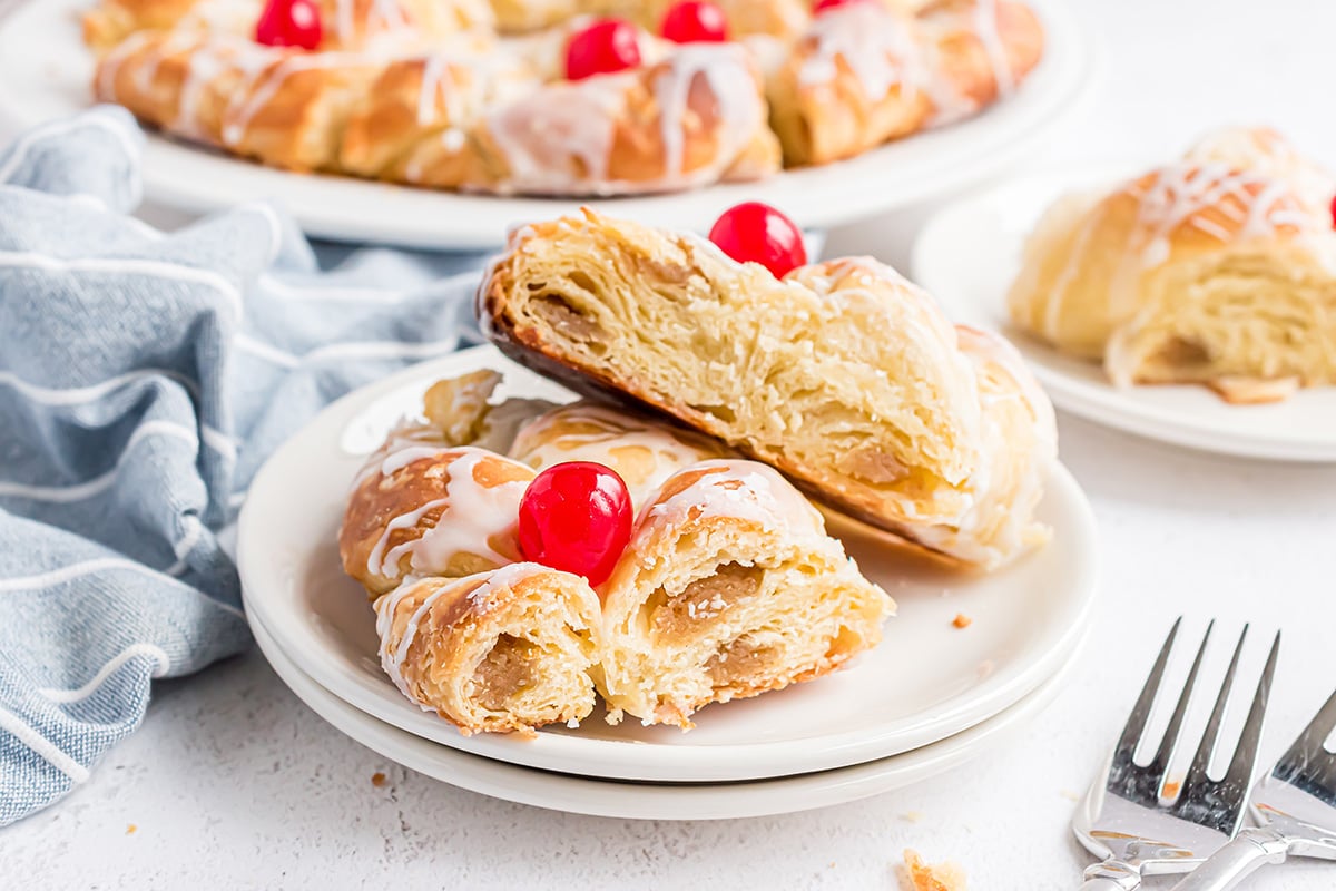 two slices of pastry ring on a serving plate