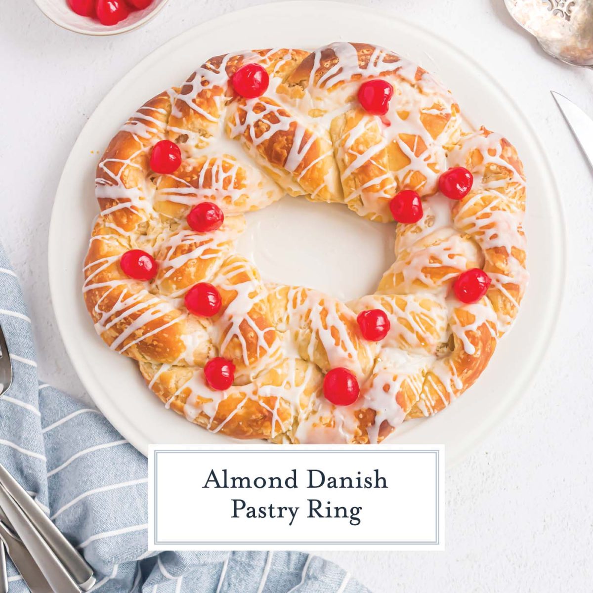 overhead of coffee cake ring iced with cherries 