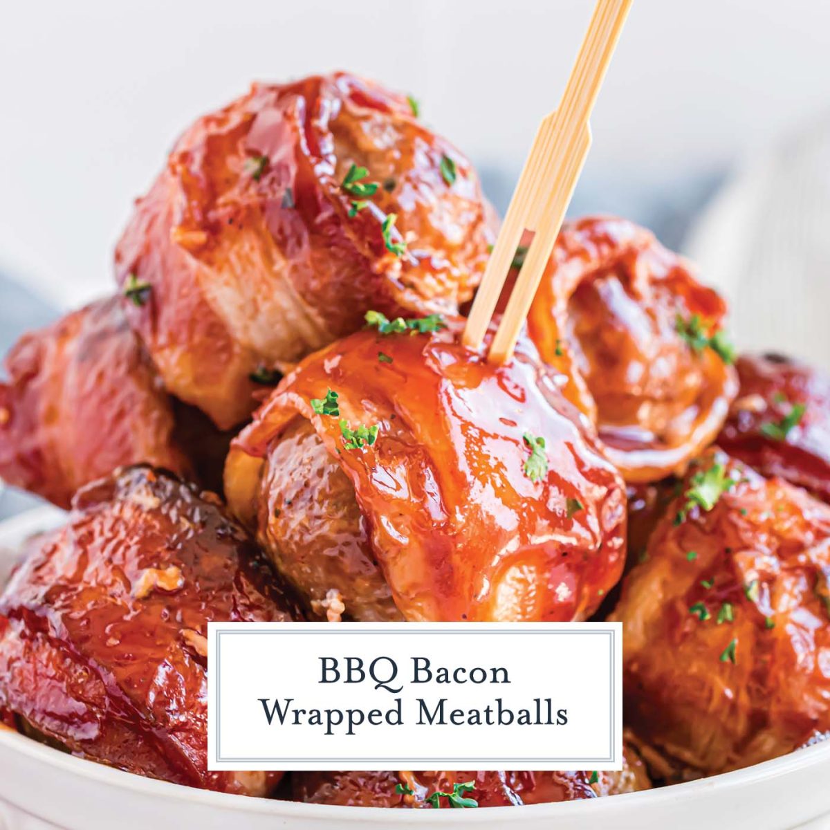 pile of BBQ meatballs with a wooden toothpick in one 