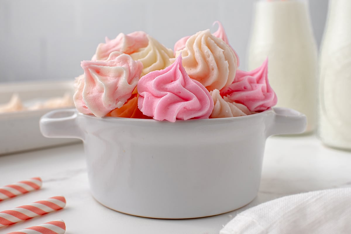 head-on view of rosette cream cheese candy in a white bowl
