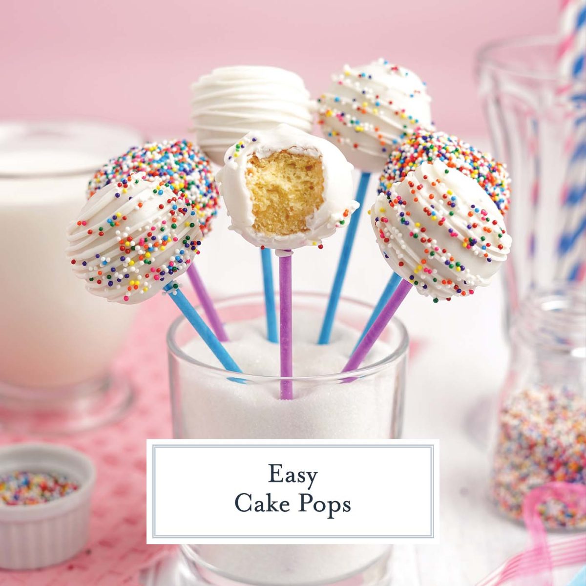 cake pops in a glass with rainbow sprinkles 