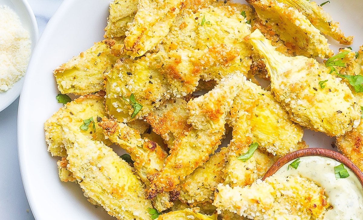 close up of bread artichoke hearts 