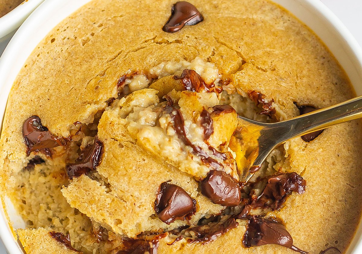 close up of creamy baked oats with chocolate 