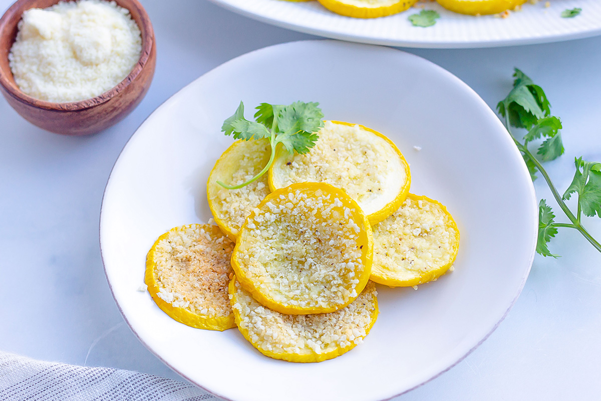 sliced baked squash on a white plate