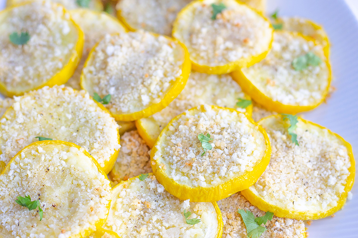 angle view of browned bread crumbs with parsley garnish 