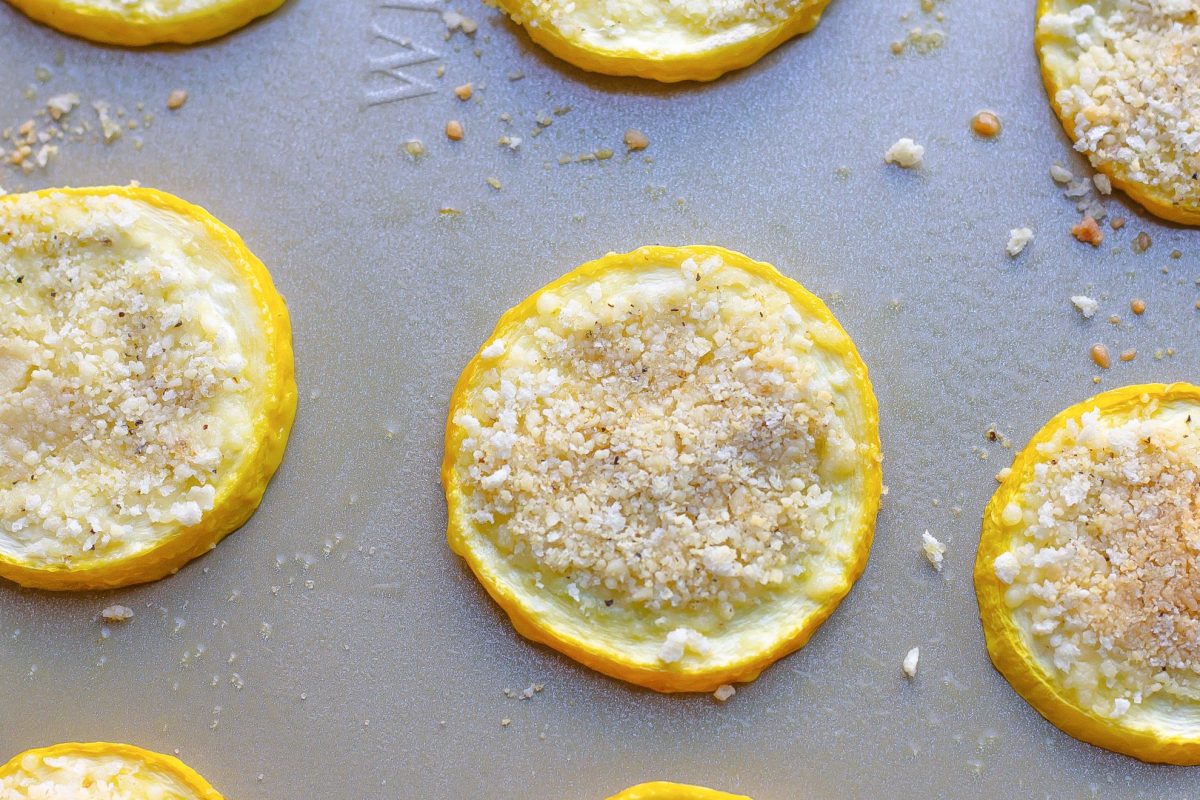 close up of squash slice with parmesan cheese and bread crumbs 