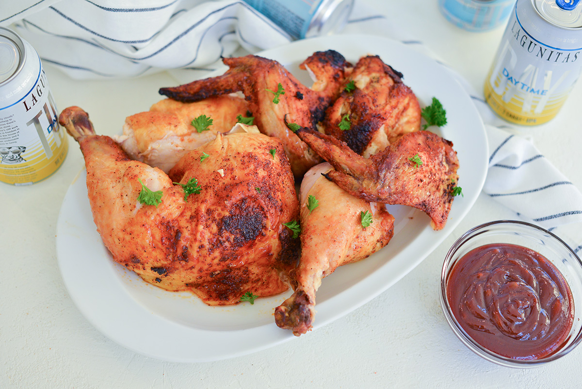 whole chicken cut into pieces on a platter 