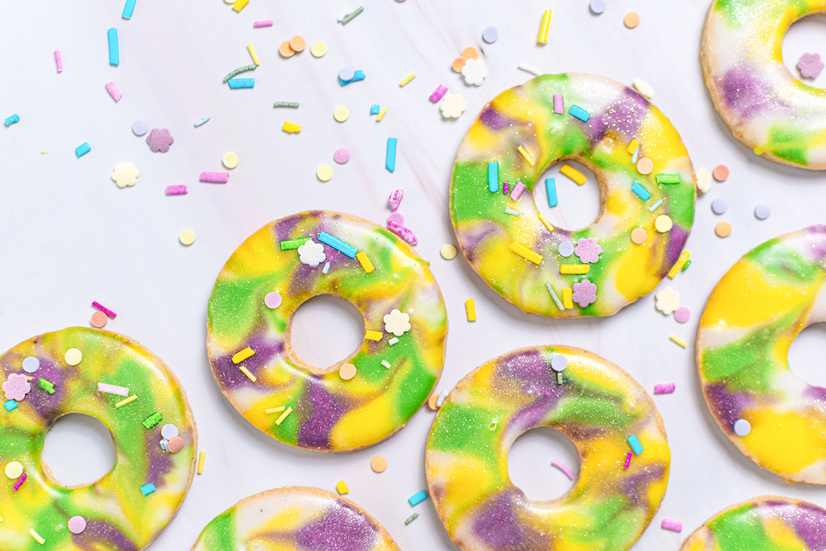 overhead of king cake cookies with sprinkles 