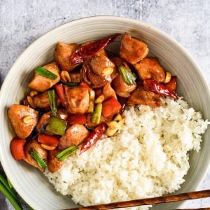 close up of kung pao chicken and white rice