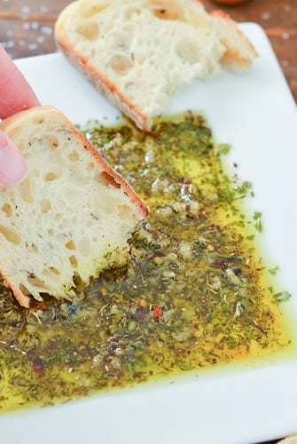 bread dipping into bread dipping oil