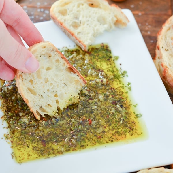 bread dipping into bread dipping oil