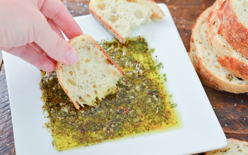 bread dipping into bread dipping oil