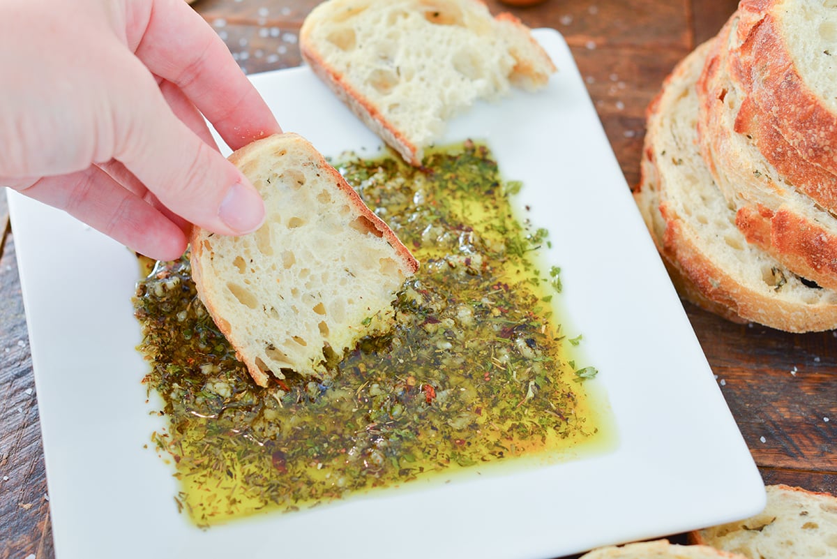 bread dipping into bread dipping oil