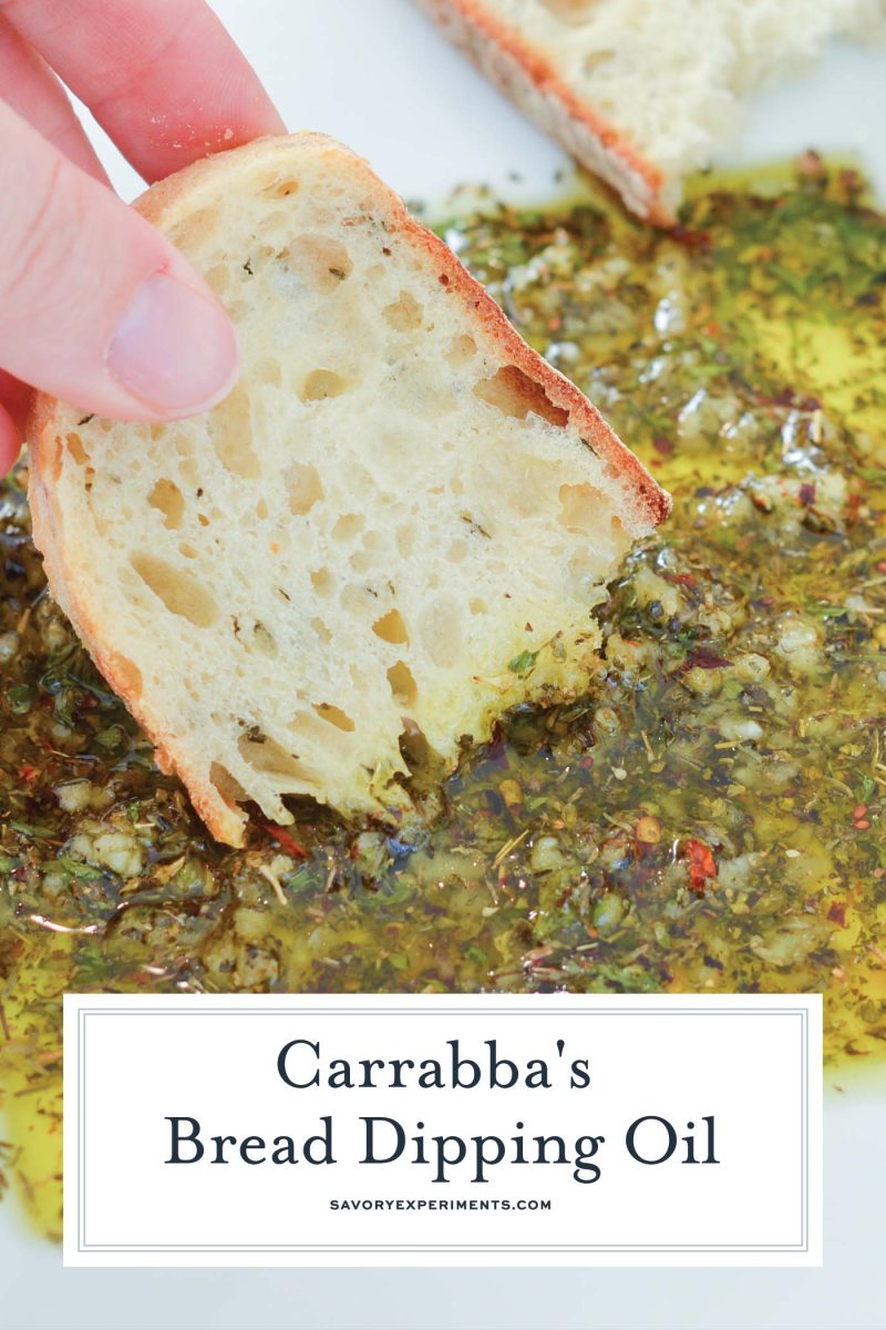 close up of bread slice in herbs and olive oil 