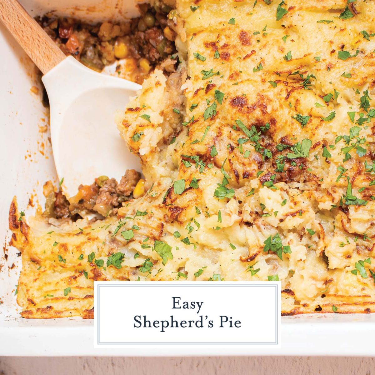 white spatula digging into a shepherds pie casserole