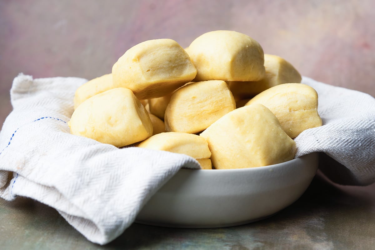 angle view of fluffy rolls in a bowl 