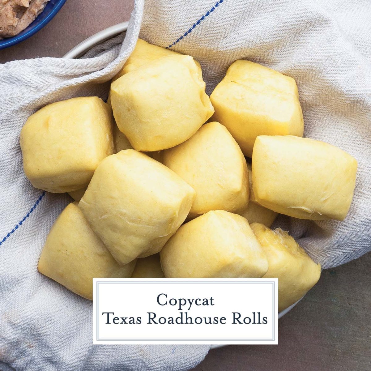 close up basket of texas roadhouse rolls with a white linen 