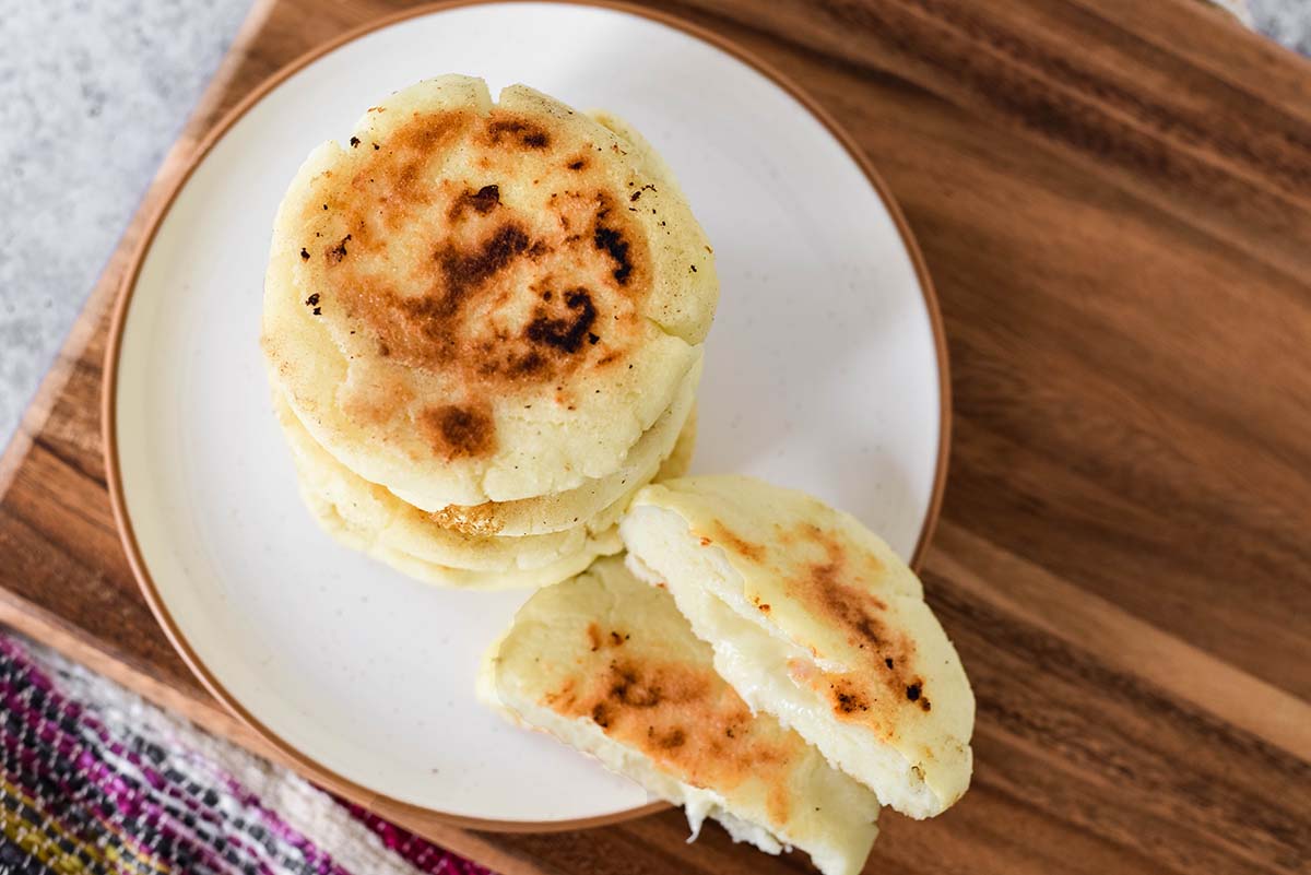 overhead serving plate of arepas 