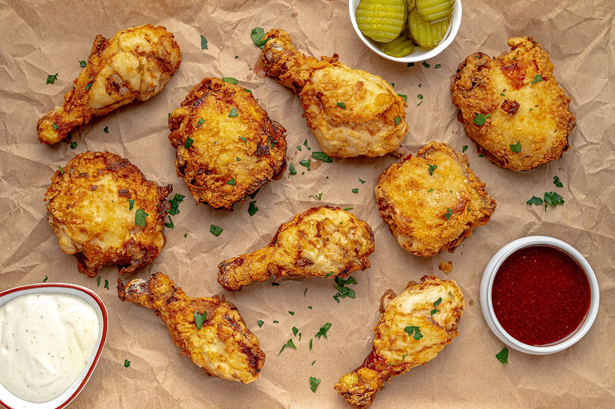 overhead shot of buttermilk fried chicken on parchment paper