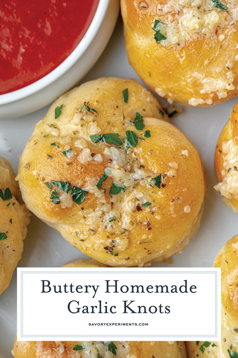 close up of a garlic knot with herb butter 