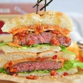 head on image of a sliced hot honey burger