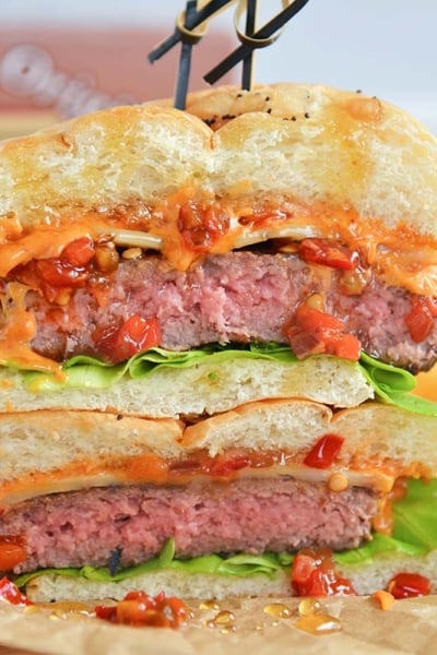 head on image of a sliced hot honey burger