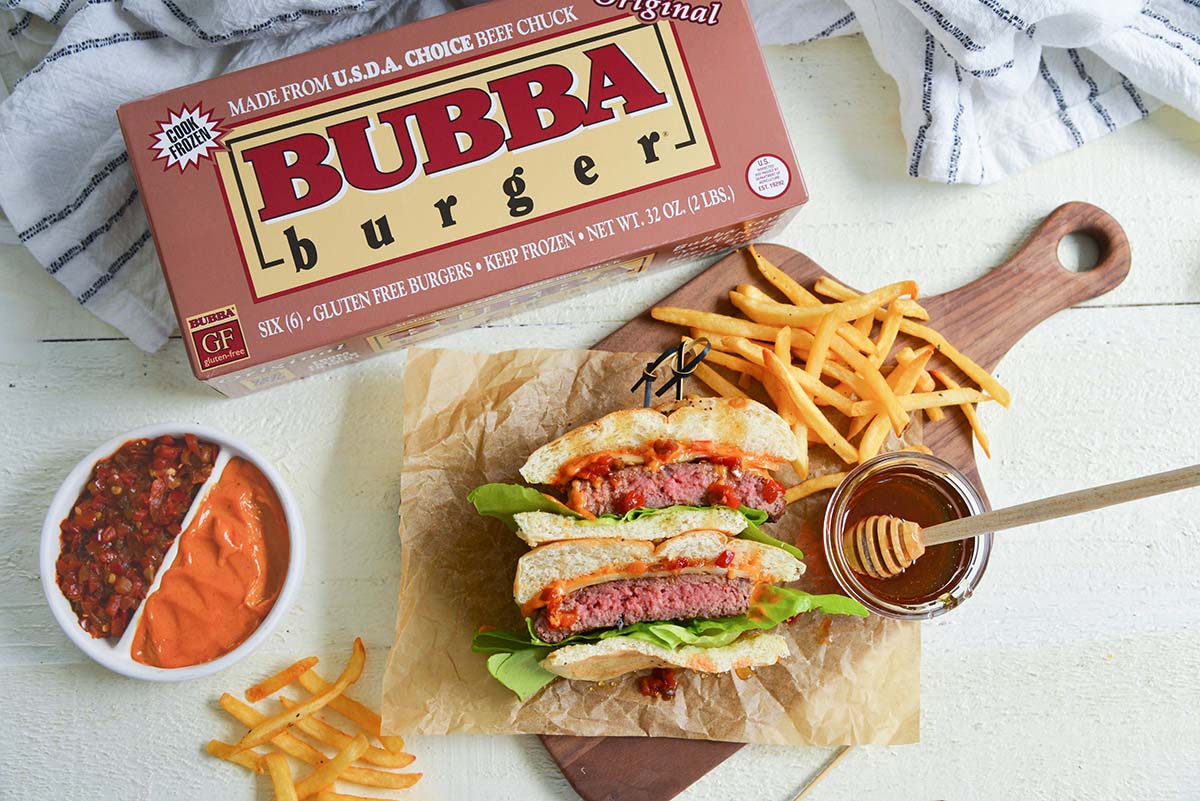 overhead of BUBBA burger packaging with hot honey burger 