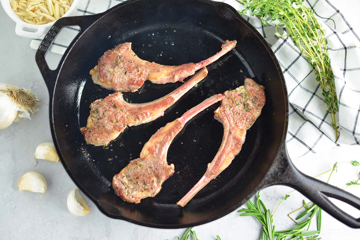pan seared lamb chops in cast iron skillet 